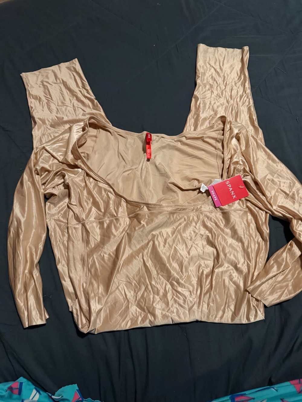SPANX Long-Sleeve Shaping Bodysuit in Nude Beige